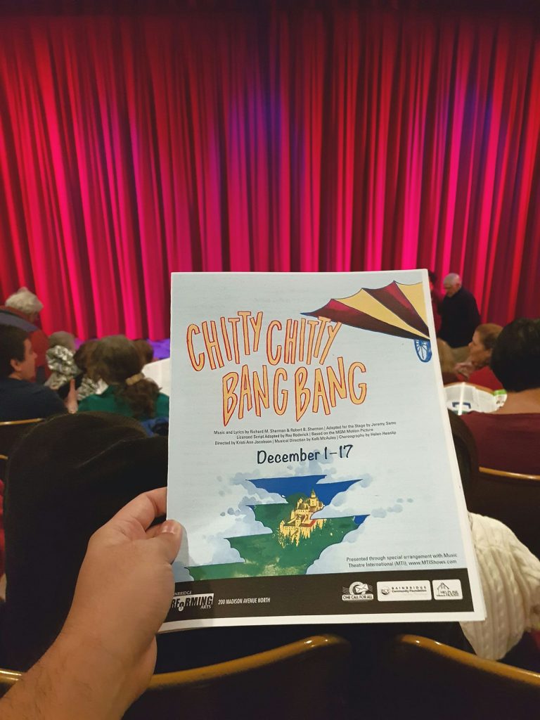 Attended an afternoon matinee of Chitty Chitty Bang Bang (musical) across Puget Sound with Raymund. Never saw the movie and didn't know it was kid-centric. ? Well performed but inwardly rolled my eyes several times. — attending Chitty Chitty Bang Bang at Bainbridge Performing Arts.